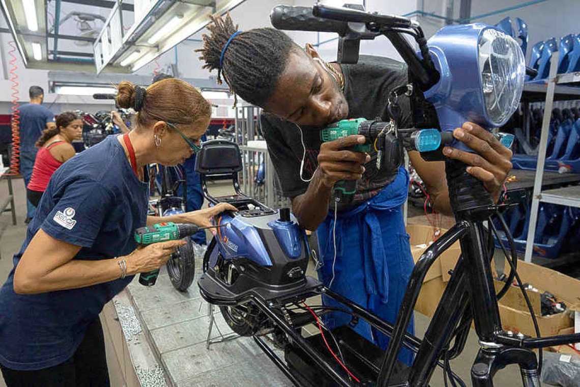 Cubans adopt electric bikes and vehicles